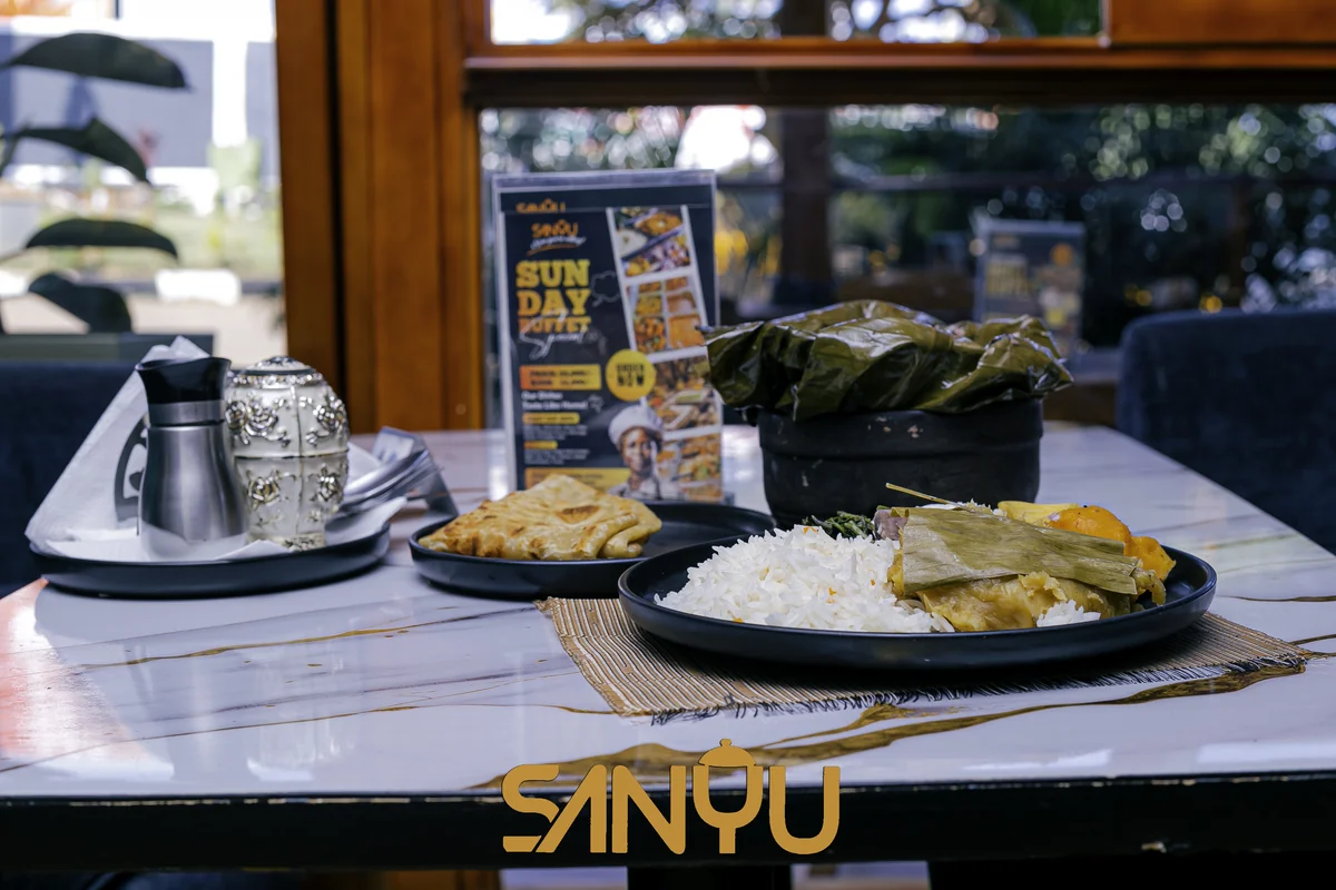 Traditional Ugandan food served with care